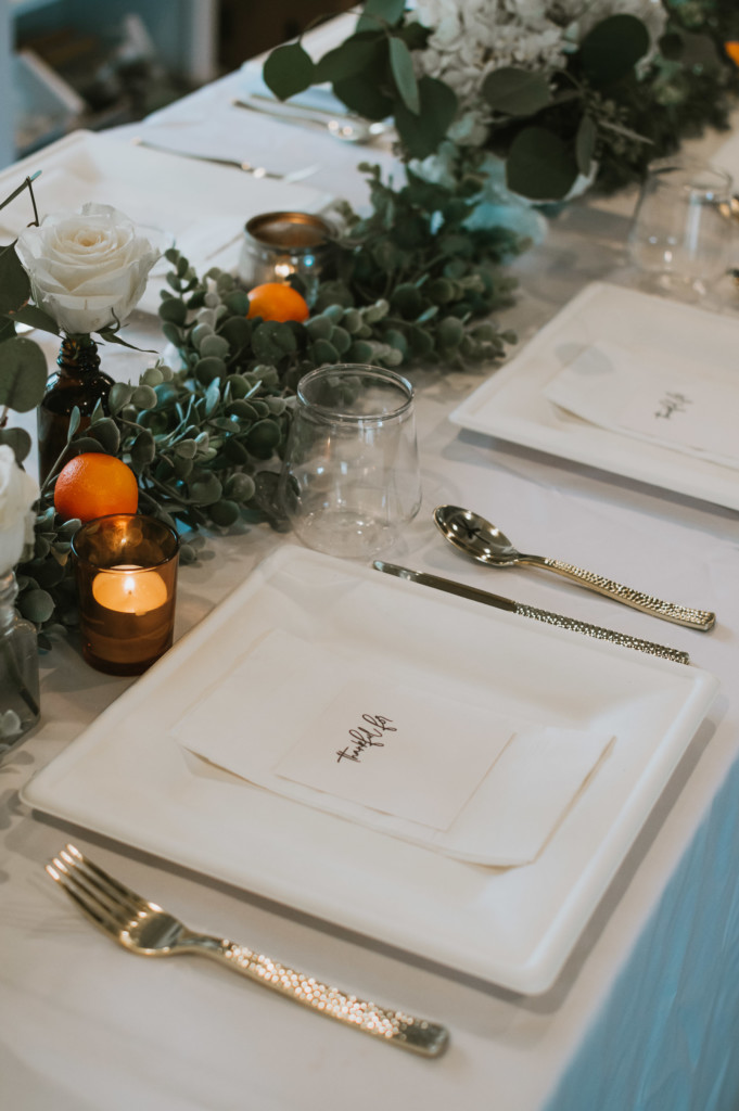 Eucalyptus and orange Thanksgiving tablescape | Nicole Victory Design