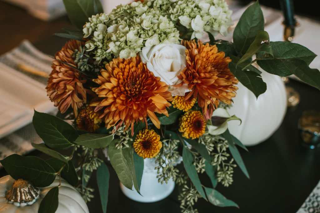 Eucalyptus and orange Thanksgiving tablescape | Nicole Victory Design