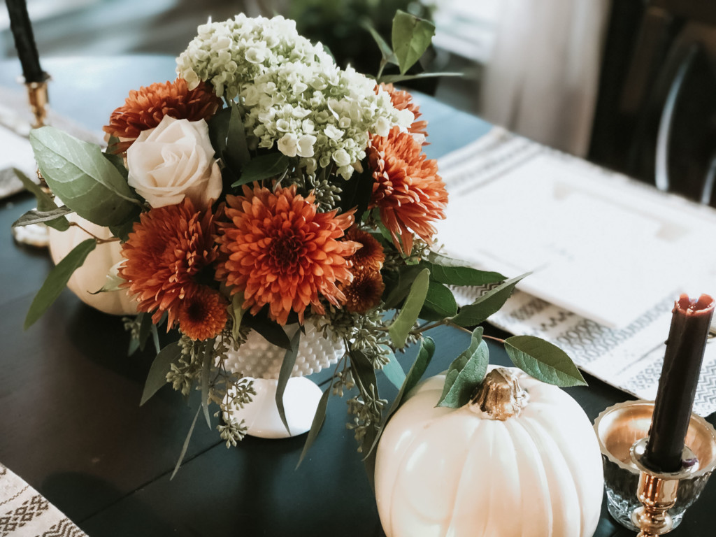 Orange Fall florals, white roses Thanksgiving tablescape | Nicole Victory Design